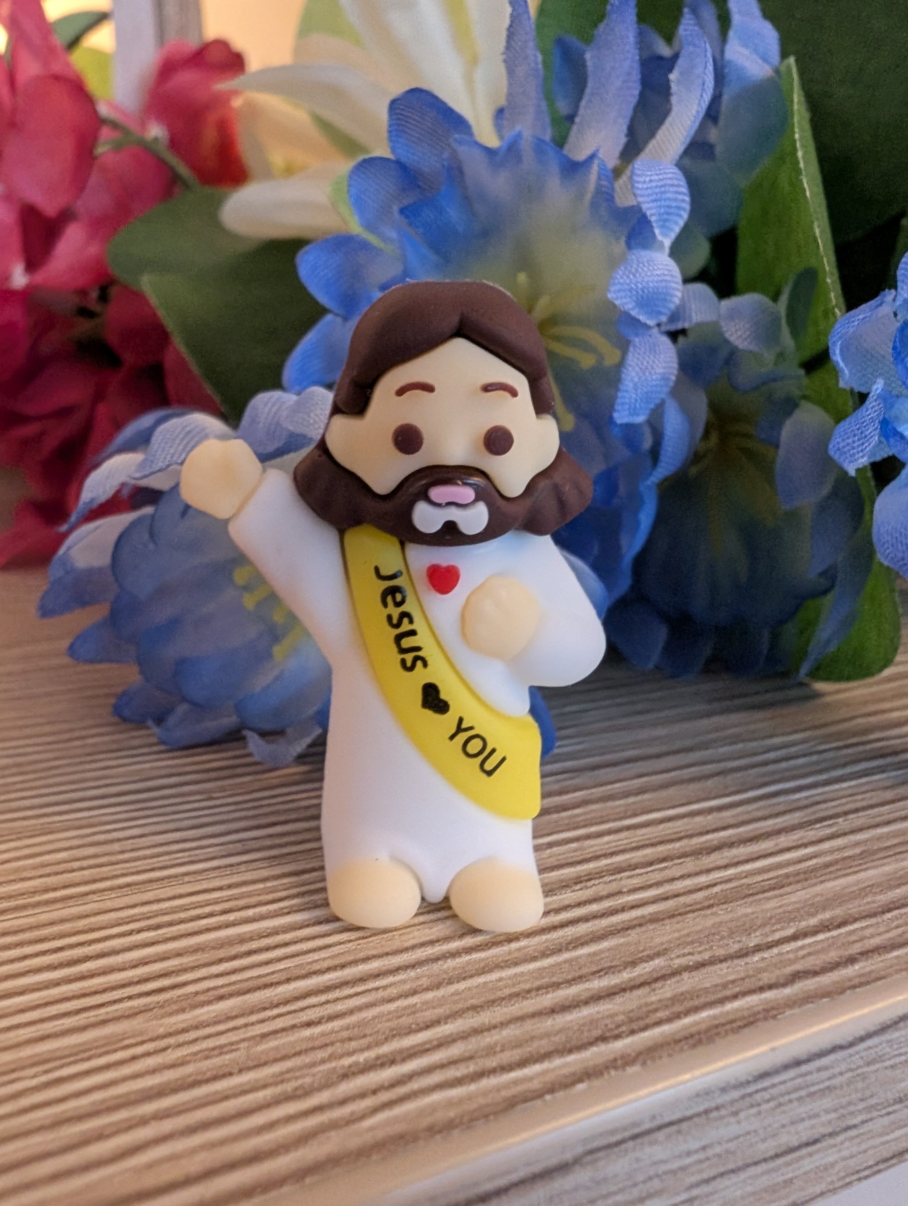 Een gevonden mini Jezusje in de hand